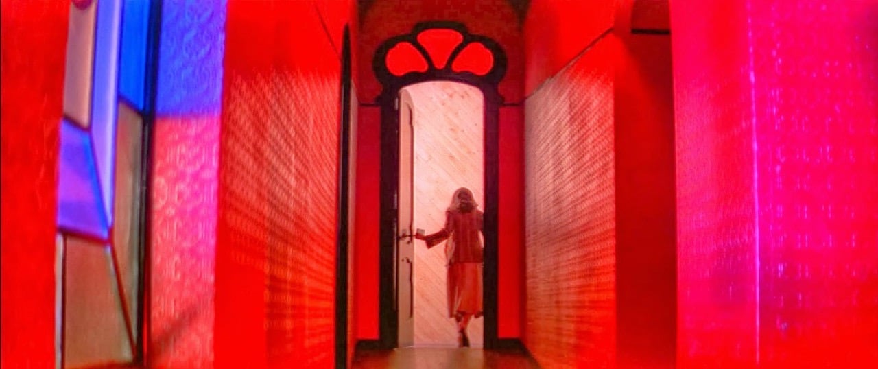 Which band collaborated with Dario Argento on the score for the original 'Suspiria' (1977)?