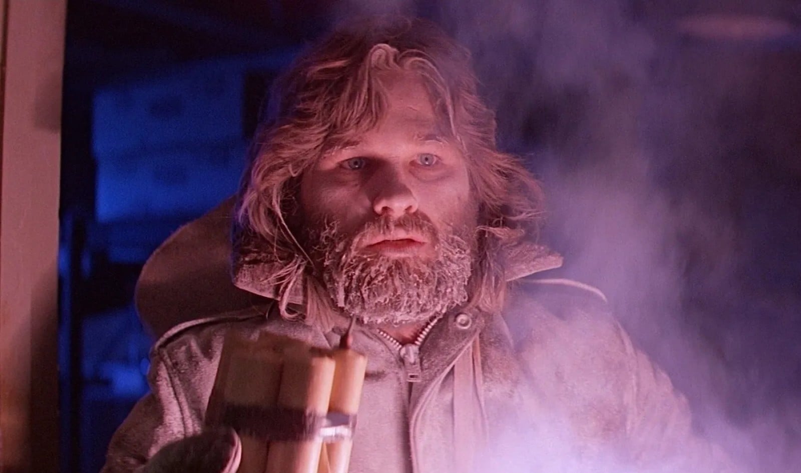 At the beginning of John Carpenter's 'The Thing' (1982), how many men make up the American Antarctic research team?